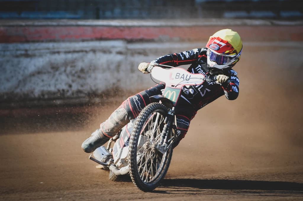 Motocross rider kicking up dust